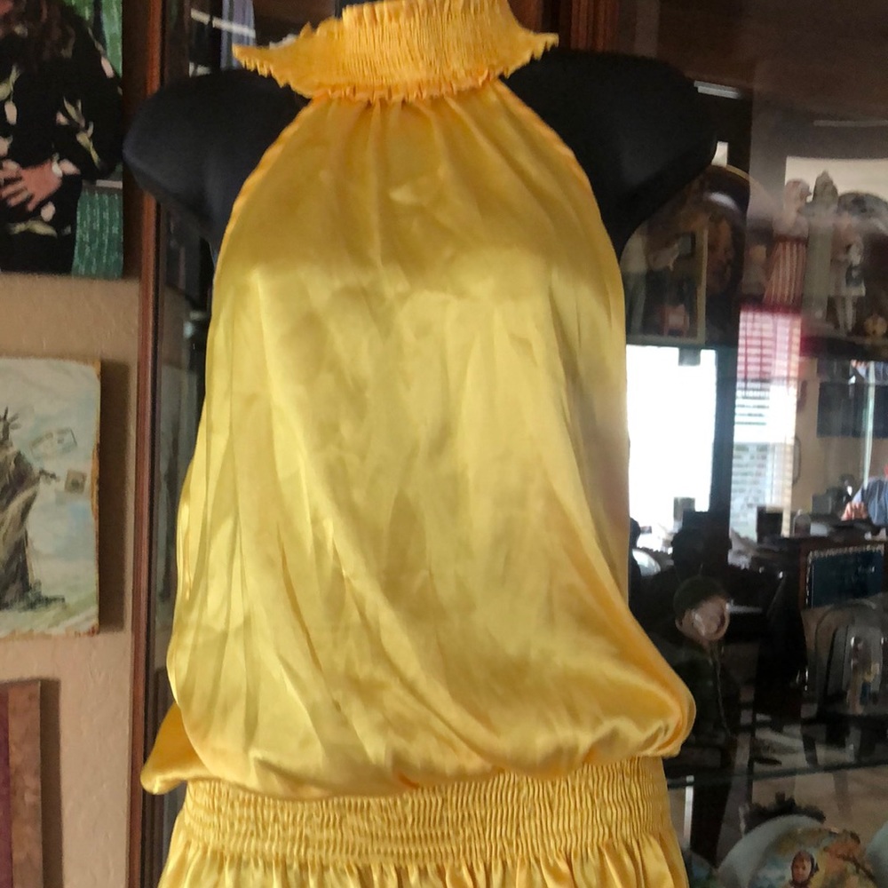 Yellow halter top silky size large ties in the back